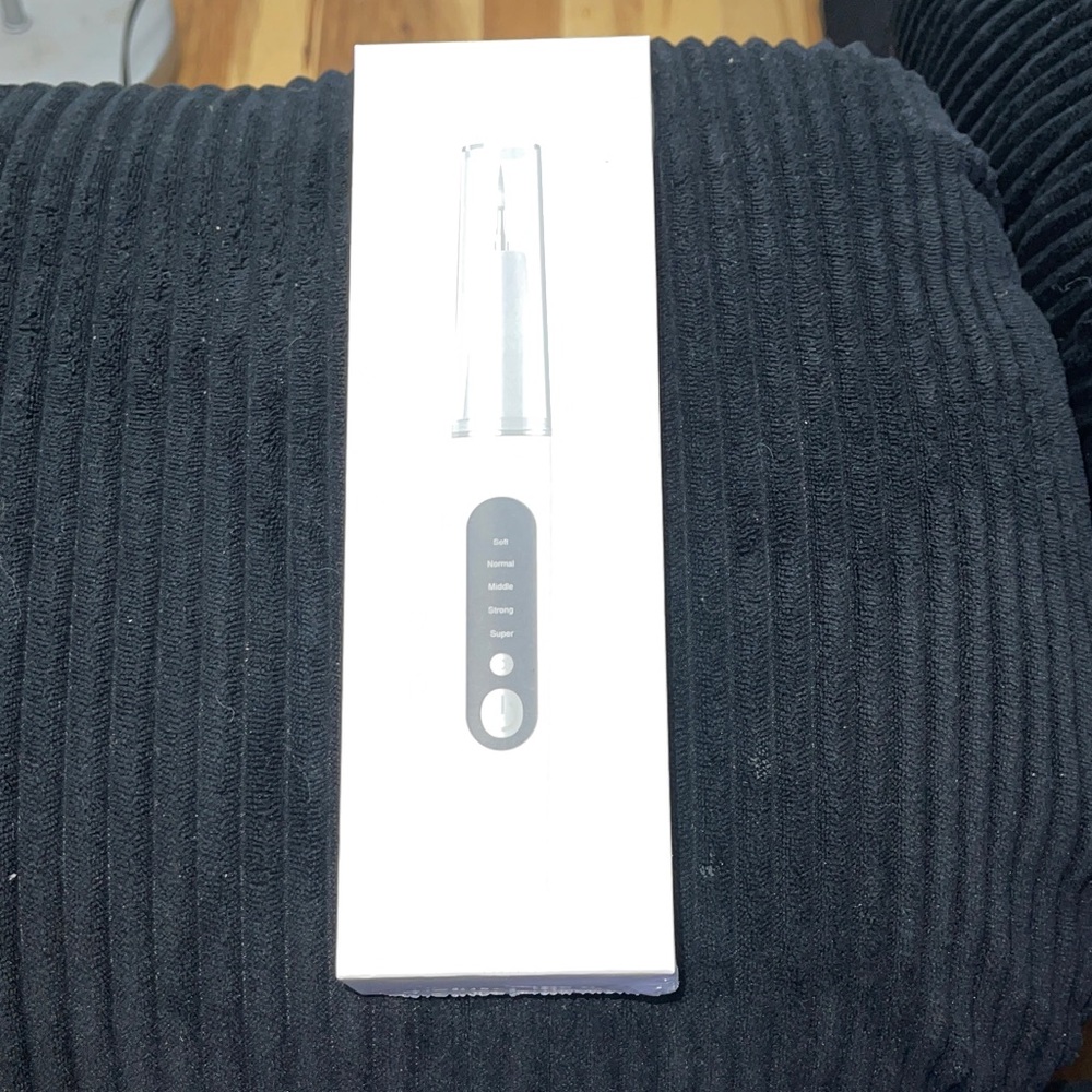Brand new in plastic never used White Electric Tarter Remover